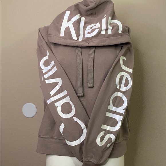 Calvin Klein Tops - Calvin Klein Jeans tan logo graphic statement hoodie 🖤🖤M